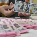 Rupiah Tembus Rp18.000 per Dolar AS
